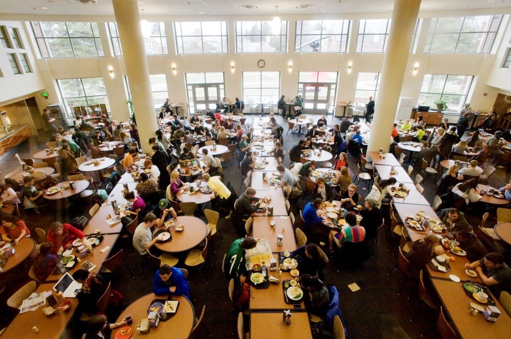 Students dine Wednesday noon time at The Gallery cafeteria inside Snyder-Phillips Hall. Students are concerned about the crowdedness of campus cafeterias, especially during high traffic hours of the day. Justin Wan/The State News