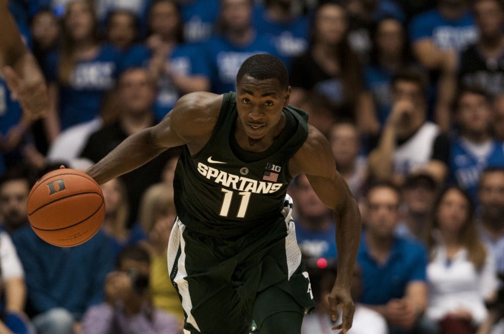 Junior guard Lourawls Nairn Jr. (11) dribbles the ball down the court during the second half of the game against Duke on Nov. 29, 2016 at Cameron Indoor Stadium in Durham, N.C. The Spartans were defeated by the Blue Devils, 69-78. 