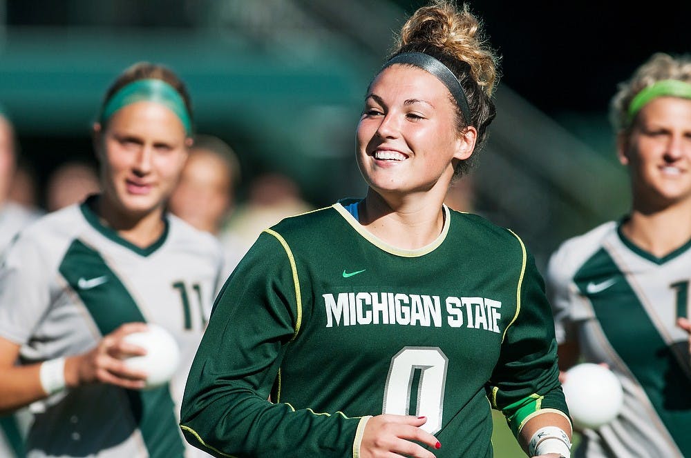 	<p>Junior goalkeeper Courtney Clem runs towards the crowd before the Sept. 5, 2013, match at DeMartin Stadium. The Spartans tied the Grizzlies, 1-1, after playing two scoreless overtime periods. Khoa Nguyen/ The State News</p>
