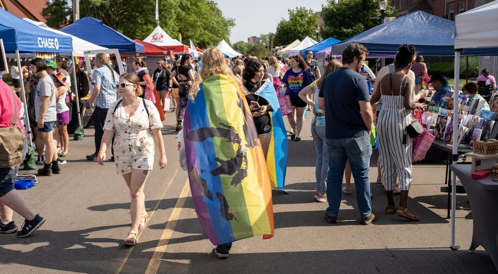 <p>Vendor booths and festival goers at Lansing Pride on June 17, 2023.</p>