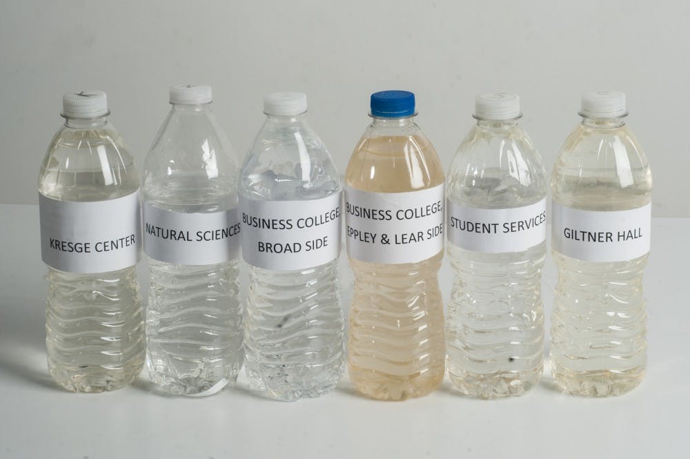 Various samples of water taken from around campus are shown on Jan. 10, 2016 at The State News studio on 435 East Grand River Ave. 