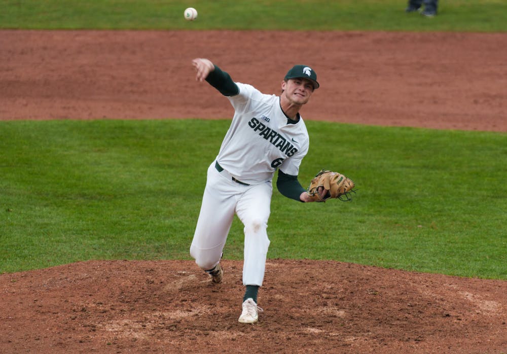 <p>Michigan State redshirt junior Wyatt Rush pitching against Youngtown State at McLane Baseball Stadium on March 30, 2022. Spartans are victorious 12-5 against Youngtown State.</p>