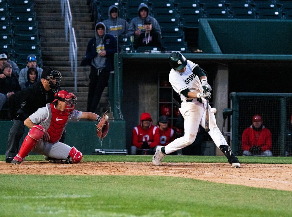 <p>MSU smacking another ball into the outfield against a struggling OSU at Jackson Field on April 7, 2023.</p>