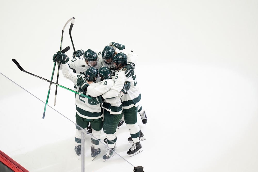 <p>The Spartans celebrate after a goal at Little Caesars Arena on Saturday, Feb. 10, 2024, for the "Duel in the D." MSU won the rivalry matchup against the University of Michigan 3-2.</p>