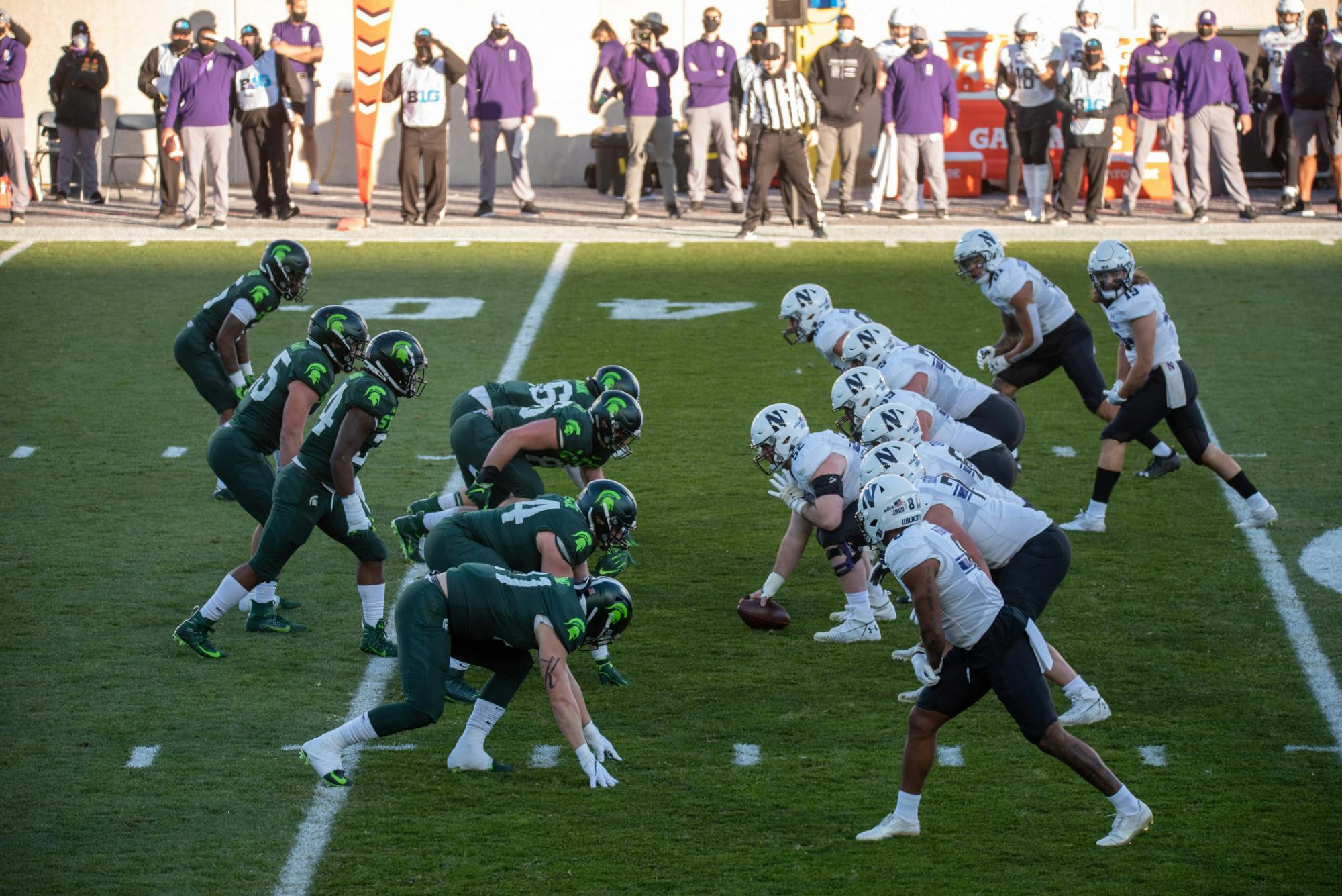 <p>Michigan State University defense lining up on the ball waiting for Northwestern&#x27;s offensive line to move on Saturday, Nov. 28, 2020.</p>