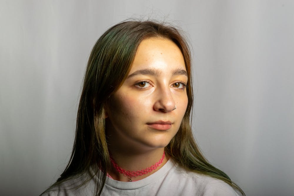 <p>Linguistics freshman Zhanna Yakubova looks serious for her portrait, taken March 22, 2022. </p>