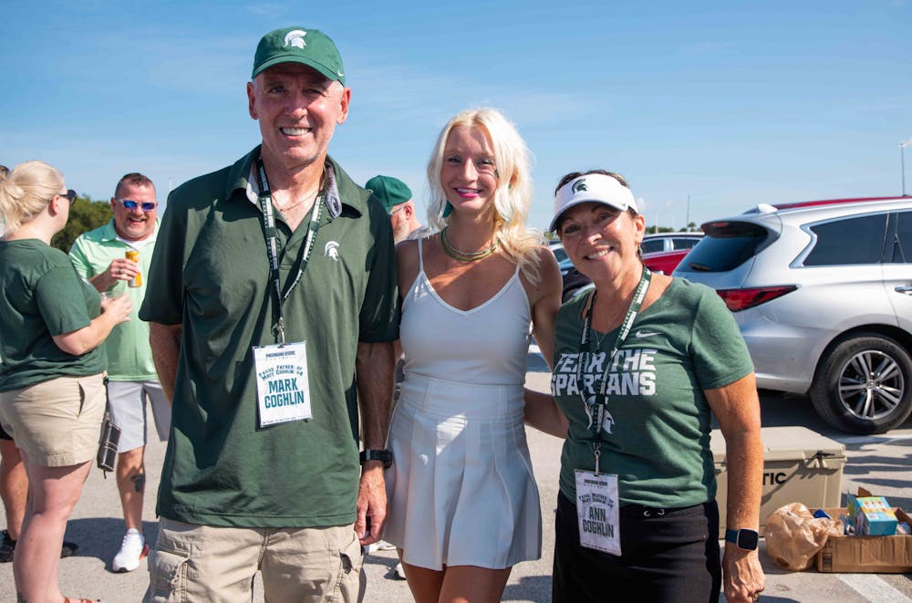<p>Ann and Mark Coghlin, parents of MSU kicker Matt Coghlin, tailgate before the game at Hard Rock Stadium. They were joined by Matt Coghlin&#x27;s girlfriend, Patty Davis, as well as many other Spartan parents to kick off the game. </p>
