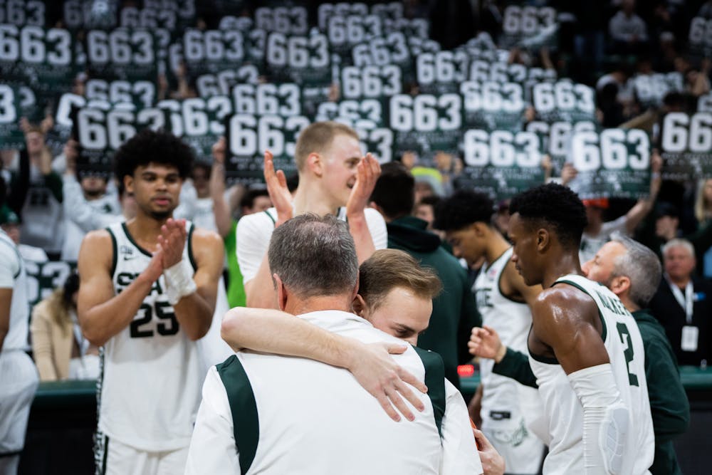 <p>Head coach Tom Izzo celebrates with his son, Steven Izzo, after becoming the winningest coach in Big Ten history with his 663rd career win. The Spartans celebrated this season&#x27;s seniors at the Breslin Center on March 6, 2022, along with Izzo&#x27;s milestone.</p>