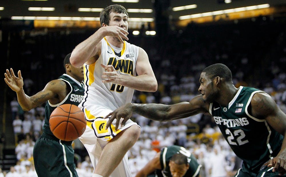 	<p>Sophomore guard Branden Dawson swats the ball away from Iowa&#8217;s Zach McCabe during a game Thursday, January 10, 2013, at Carver-Hawkeye Arena. Michigan State defeated the Hawkeyes 62-59. Photo courtesy of The Daily Iowan</p>