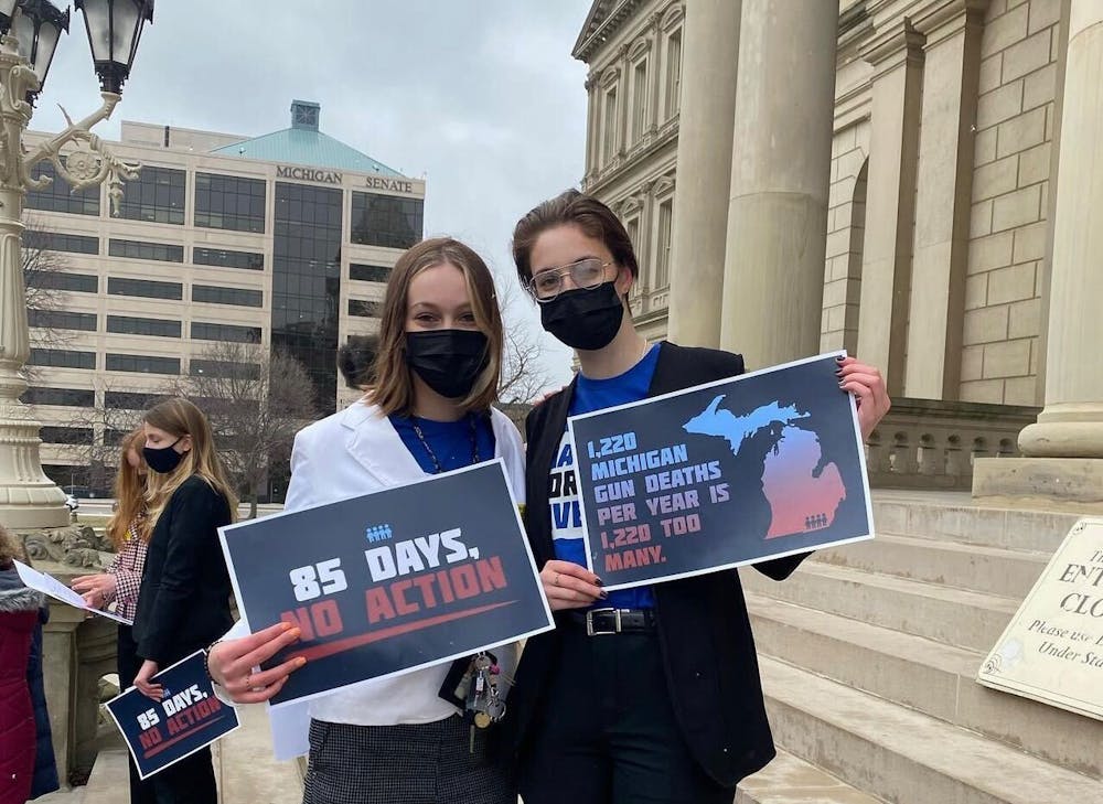 Photo of Zoe Haden and her sister, Lilah Haden, at a March For Our Lives protest in Lansing. Photo courtesy of Zoe Haden. 
