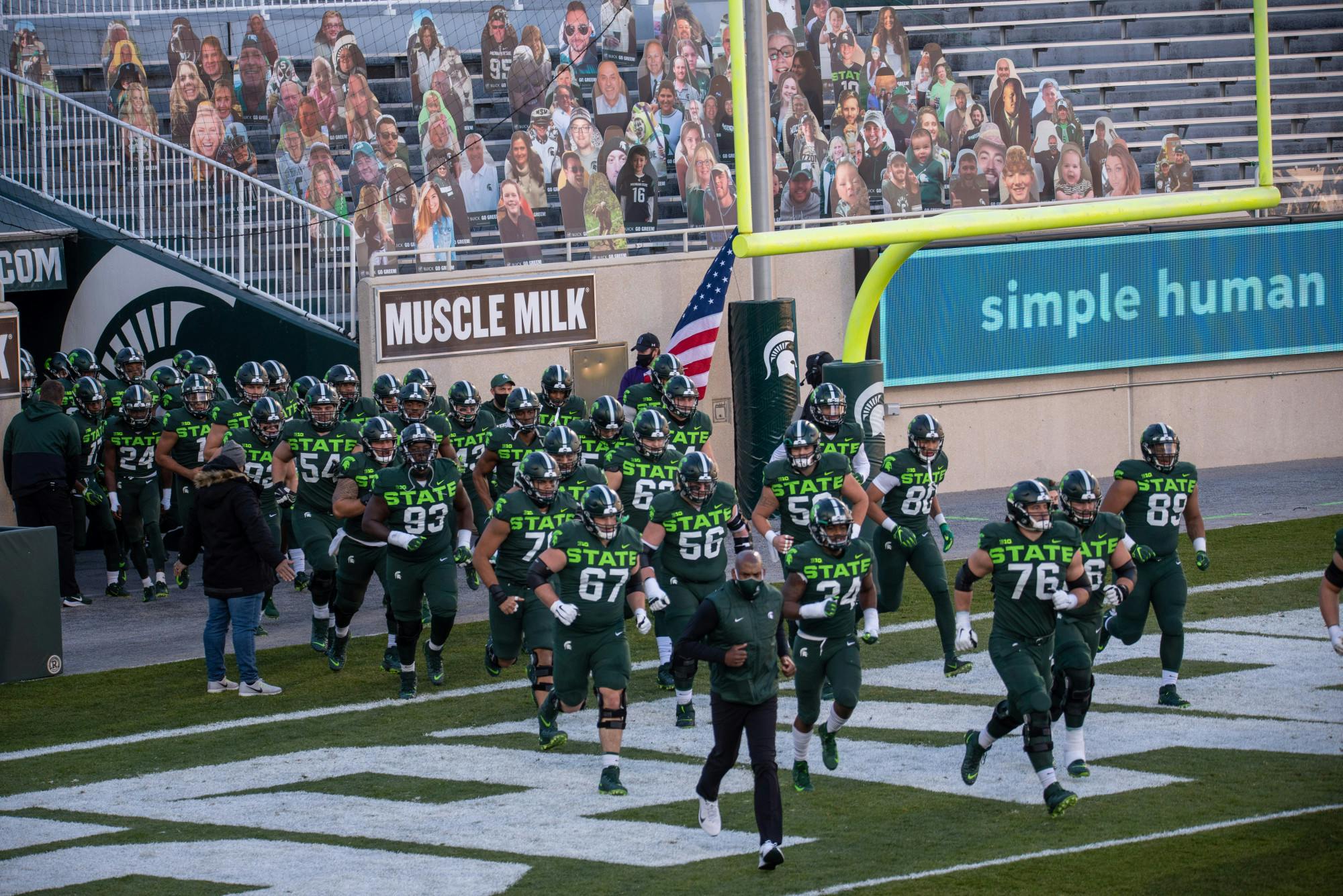 <p>Michigan State University&#x27;s football team leaving the tunnel to begin their game against Northwestern on Saturday, Nov. 28, 2020. </p>