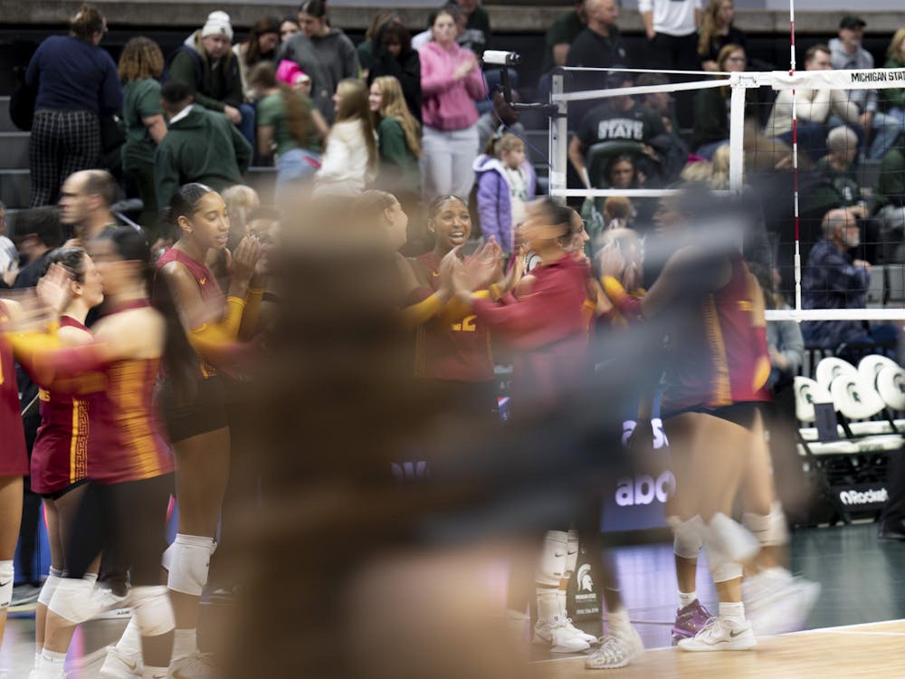 USC players cheer at the end of the game after securing their win against Michigan State at the Breslin Center on Wednesday, Nov. 26, 2025.