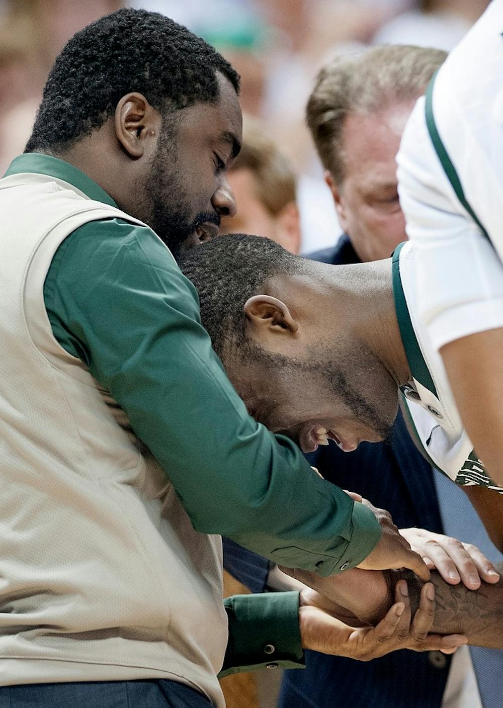 	<p>Sophomore guard Branden Dawson in pain after an injury in the early second half of the game. The Spartans defeated the Cornhuskers, 66-56, Sunday, Jan. 13, 2013, at Breslin Center. Justin Wan/The State News</p>