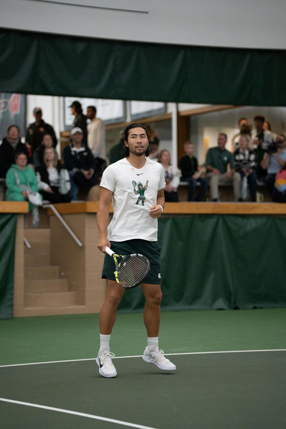 <p>Senior Kazuki Matsuno waits for the ball during his doubles match with sophomore Josh Portnoy against Michigan at the MSU Tennis Center on March 30, 2023. The Spartans lost to the Wolverines 6-1.</p>