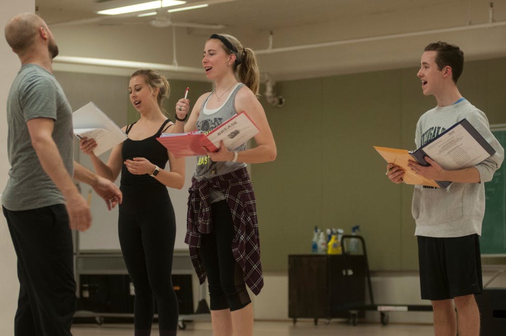 From left to right, assistant professor Brad Willcuts, theatre junior Bethany Heinlein, theatre senior Kendall Kotcher and mechanical engineering freshman Josh Cassady rehearse on Feb. 24, 2016 at MSU Department of Theatre.  The play Grease premieres April 25, 2016. 