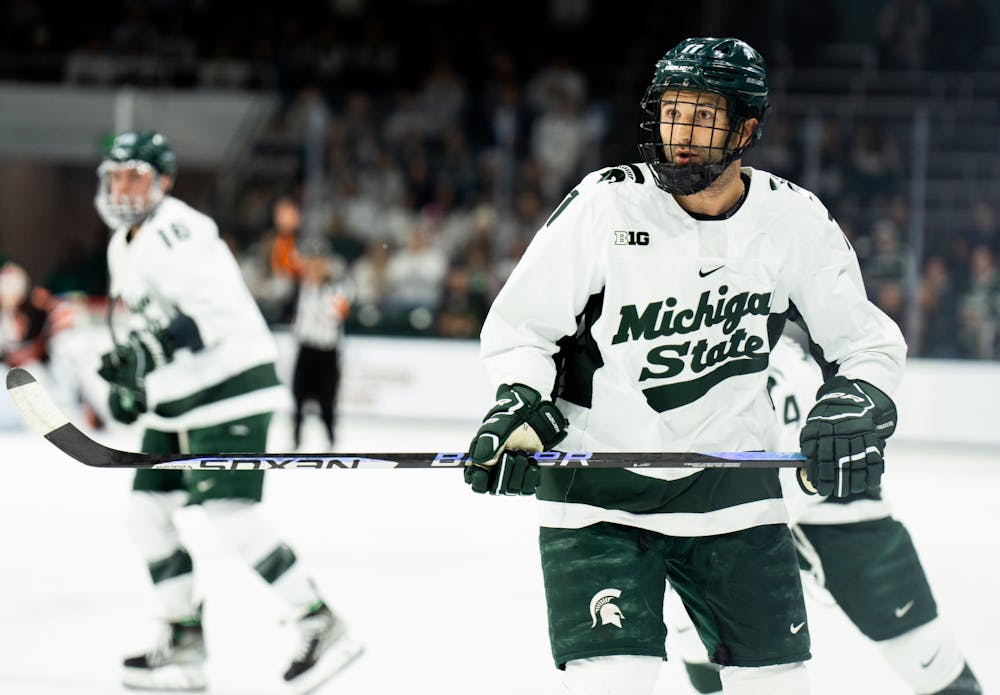 <p>MSU sophomore defenseman David Gucciardi (7) prepares for a play during a game against Bowling Green State University at Munn Ice Arena on Oct. 7, 2022. The Spartans lost against the Falcons with a score of 3-1. </p>