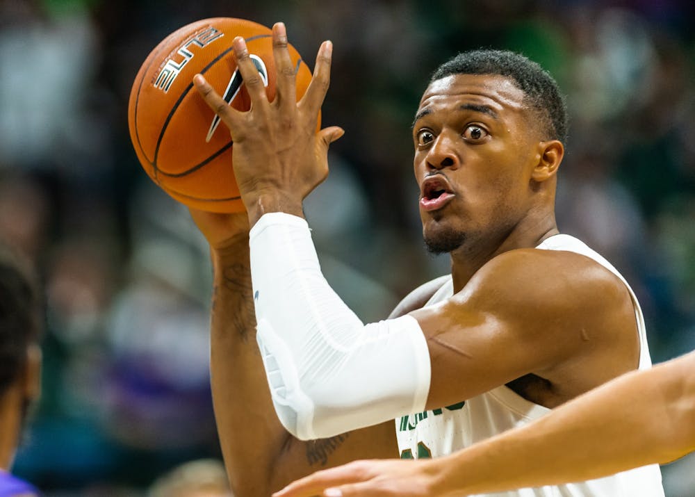 <p>Junior forward Xavier Tillman looks to pass against Albion College. The Spartans defeated the Britons, 85-50, at the Breslin Student Events Center on Oct. 29, 2019. </p>