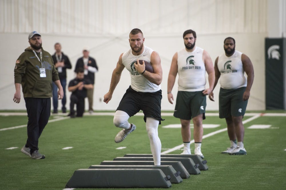 Senior tight end Matt Sokol runs a drill during the annual Pro Day at the Duffy Daugherty Building on Monday, March 18, 2019. (Nic Antaya/The State News)