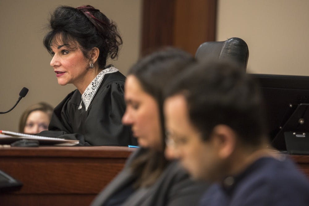 <p>Judge Rosemarie Aquilina talks to Emma Ann Miller, 15, on the fifth day of Ex-MSU and USA Gymnastics Dr. Larry Nassar's sentencing on Jan. 22, 2018 at the Ingham County Circuit Court in Lansing.&nbsp;</p>
