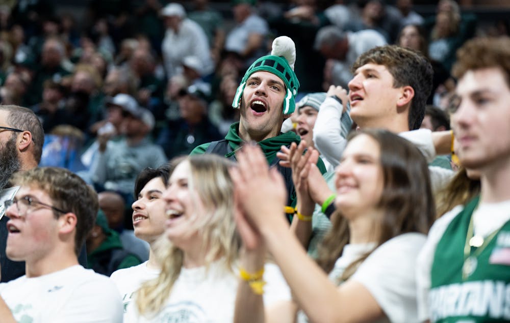 <p>An MSU fan cheers on the men&#x27;s basketball team during a game against Villanova at the Breslin Center on Nov. 18, 2022. The Spartans defeated the Wildcats 73-71. </p>