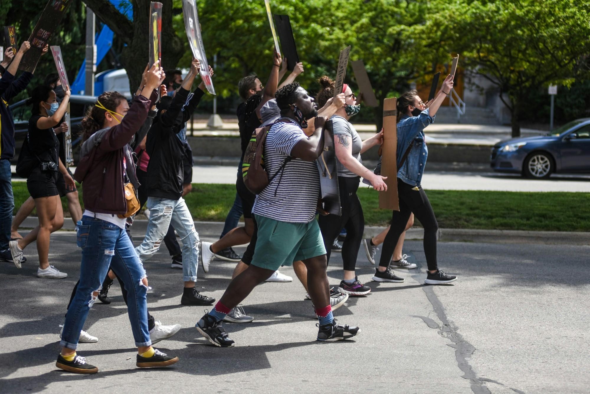 People march during a die-in protest June 12, 2020.