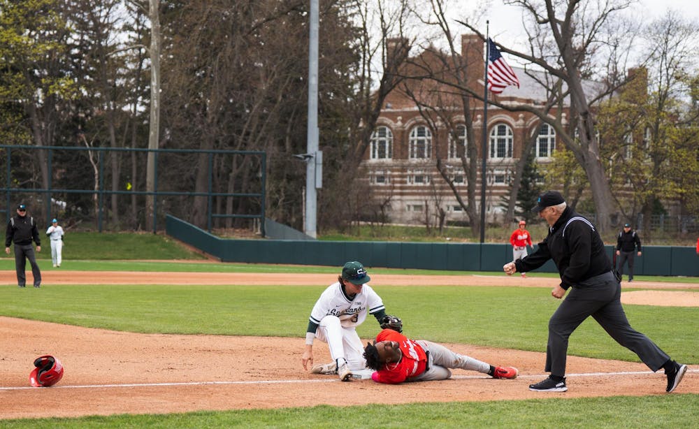 <p>Ohio State sophomore infielder Lee Ellis' (1) helmet flies off while sliding on a base at McLane Stadium on April 19, 2025.</p>