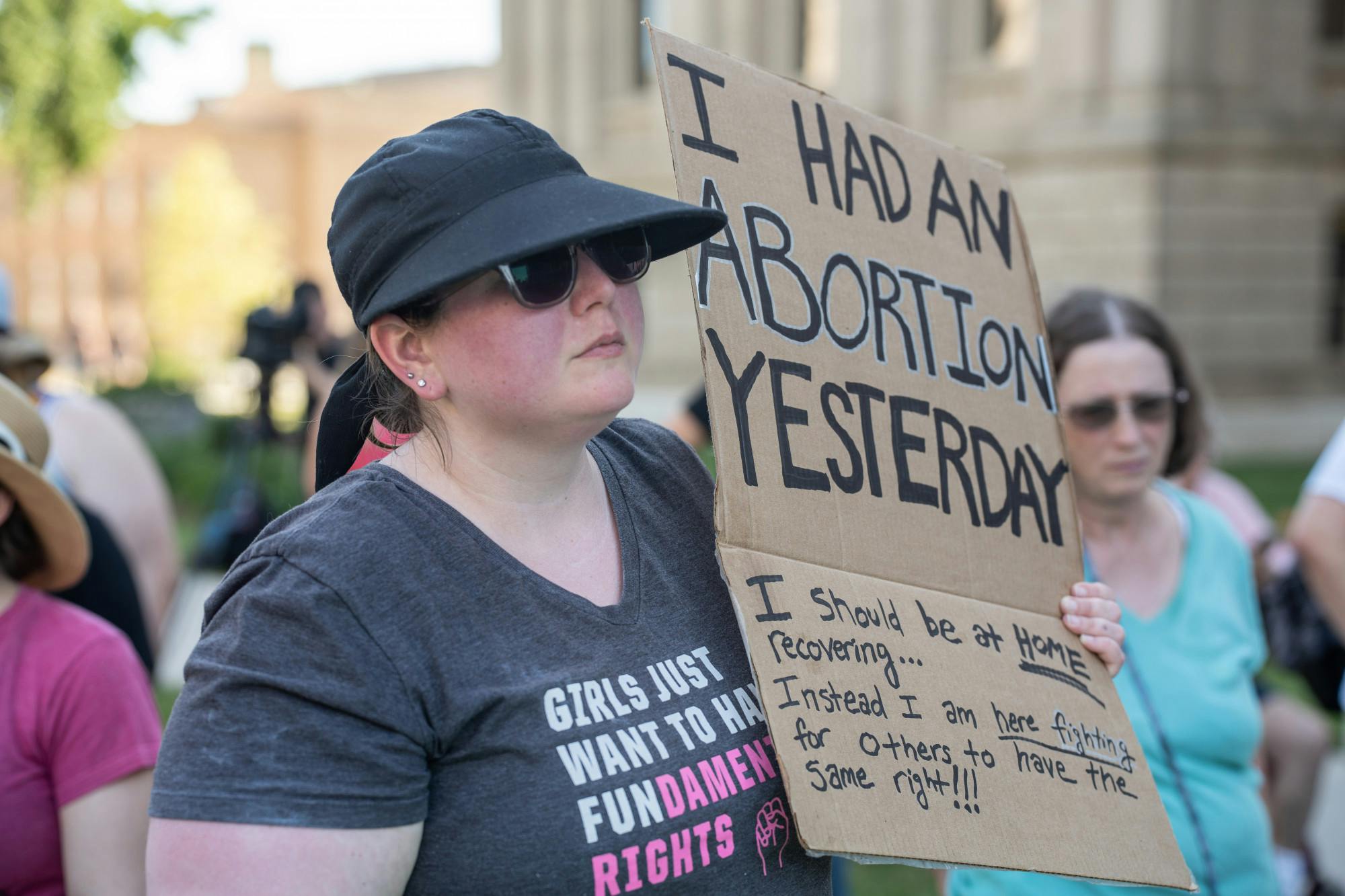 <p>Angelique Duphene stands on the Capitol Lawn, one day after getting an abortion to protest the overturning of Roe v. Wade on June 24, 2022.</p><p>"I have two young daughters and I am horrified at the prospect of losing the right that I just had yesterday," Duphene said.</p>