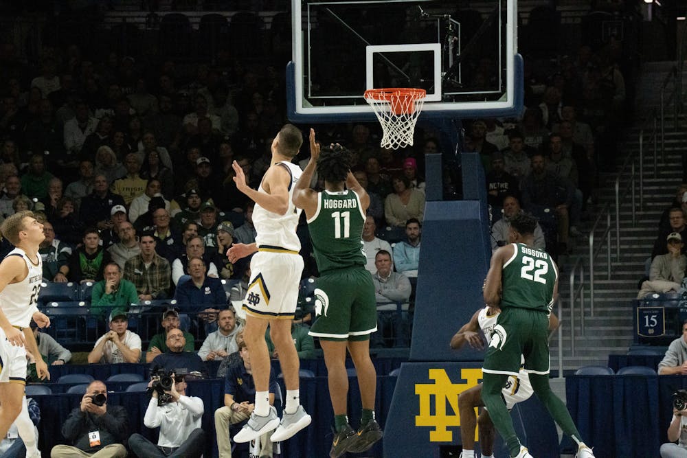 <p>Junior guard A.J. Hoggard attempting a shot during the Notre Dame v. MSU game held at the Joyce Center on November 30, 2022. The Spartans lost to the Fighting Irish 52 -70.</p>