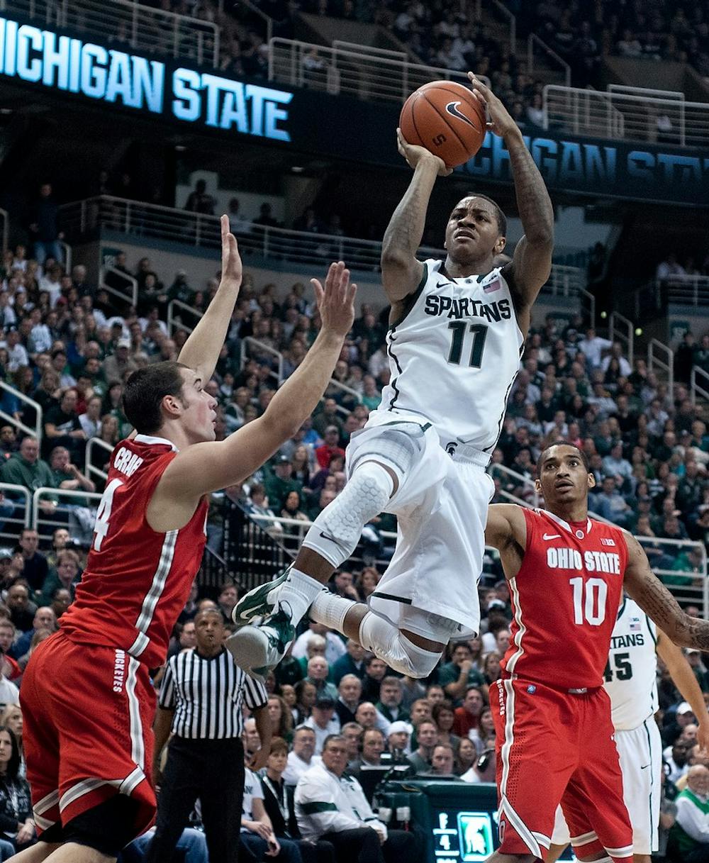 	<p>Junior guard Keith Appling takes a jump shot against Ohio State on Saturday, Jan. 19, 2013 at Breslin Center.  Appling scored 15 points in the game. Katie Stiefel/The State News</p>