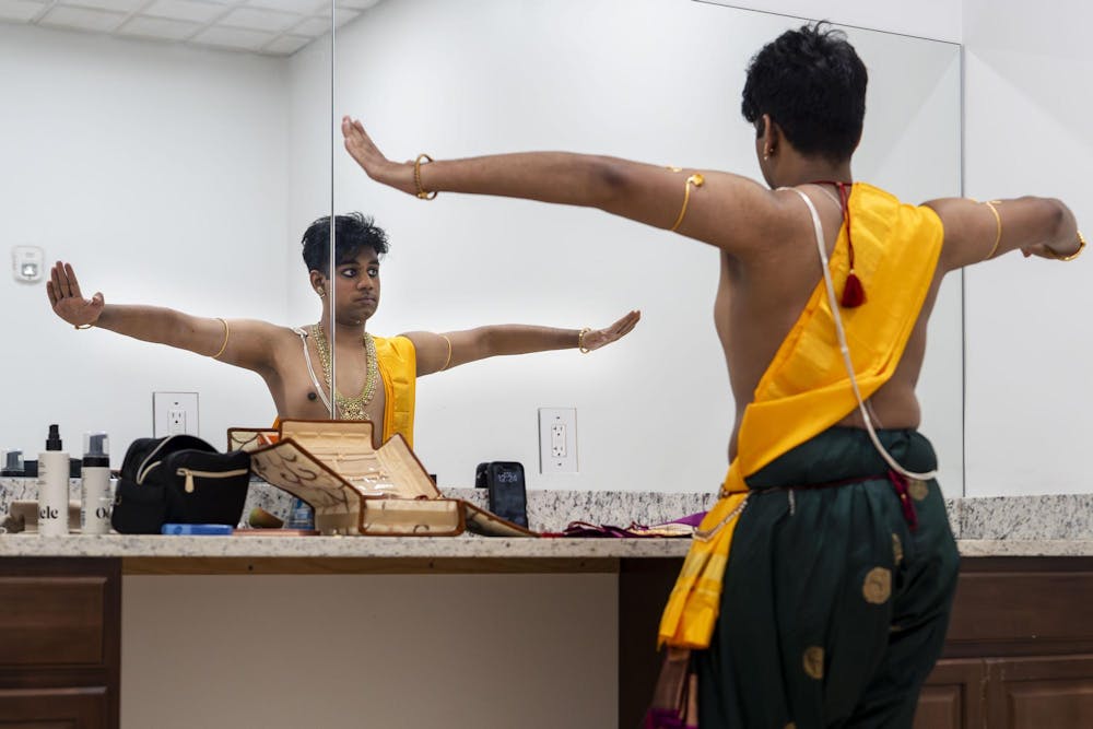 Abhinav Anand practices and mentally prepares to go on stage for the Shivaratri festival at the Sri Sharadamba Temple in Farmington Hills, Mich. on March 8, 2026. “I’m nervous but excited,” he said.