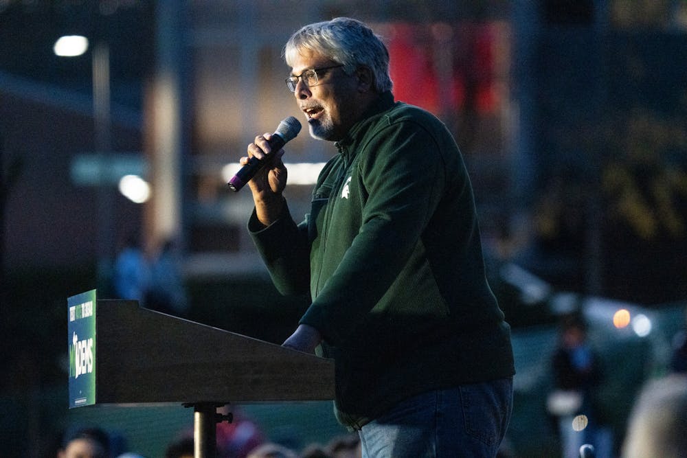 Sam Singh, running for election to the Michigan State Senate, speaks out to the crowd at the Democratic GOTV Grand Finale Rally at MSU's Auditorium Field on Nov. 7, 2022. 