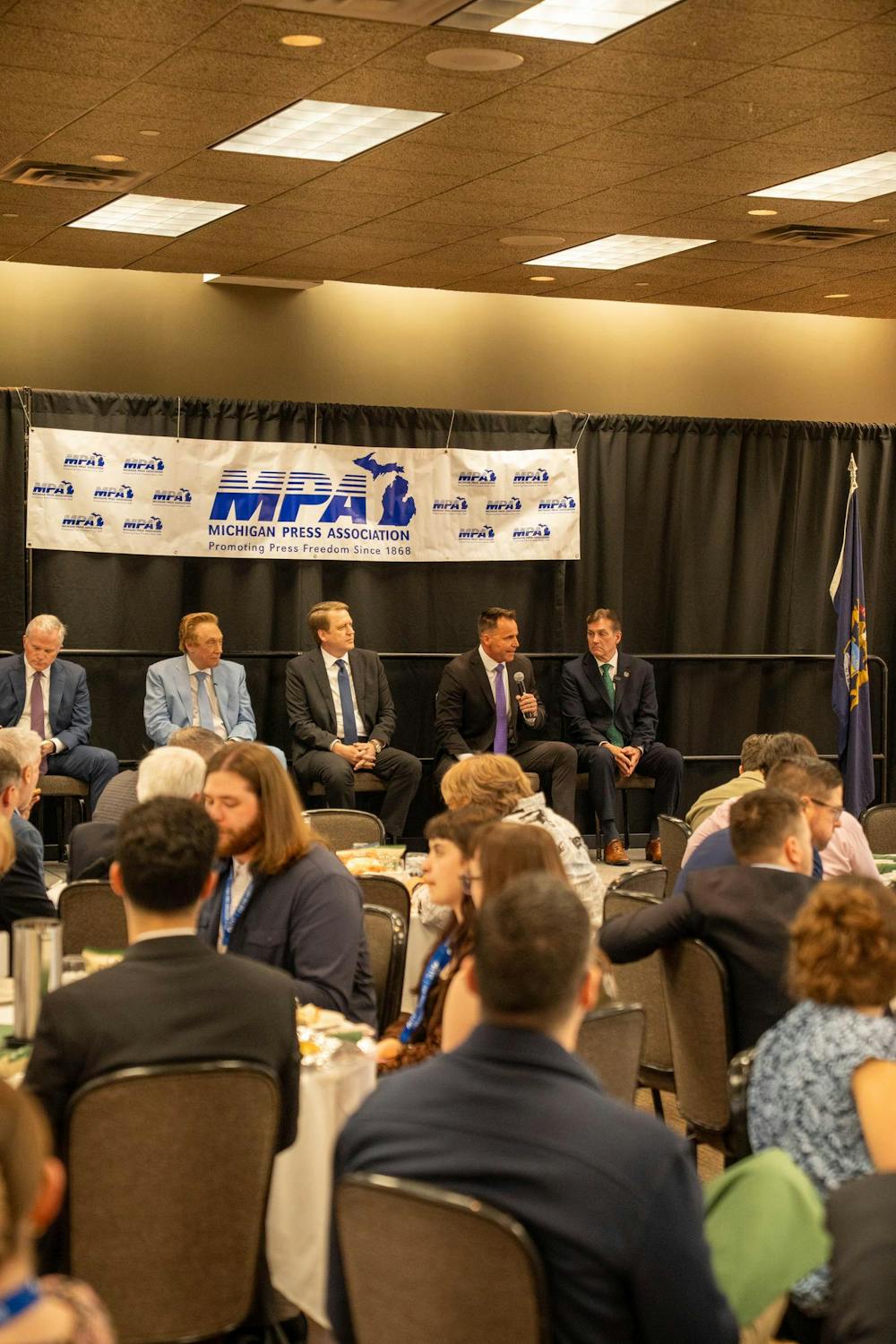Candidates speaking during the MPA Gubernatorial Candidate Luncheon at the Kellogg Center in East Lansing, on April 23, 2026.