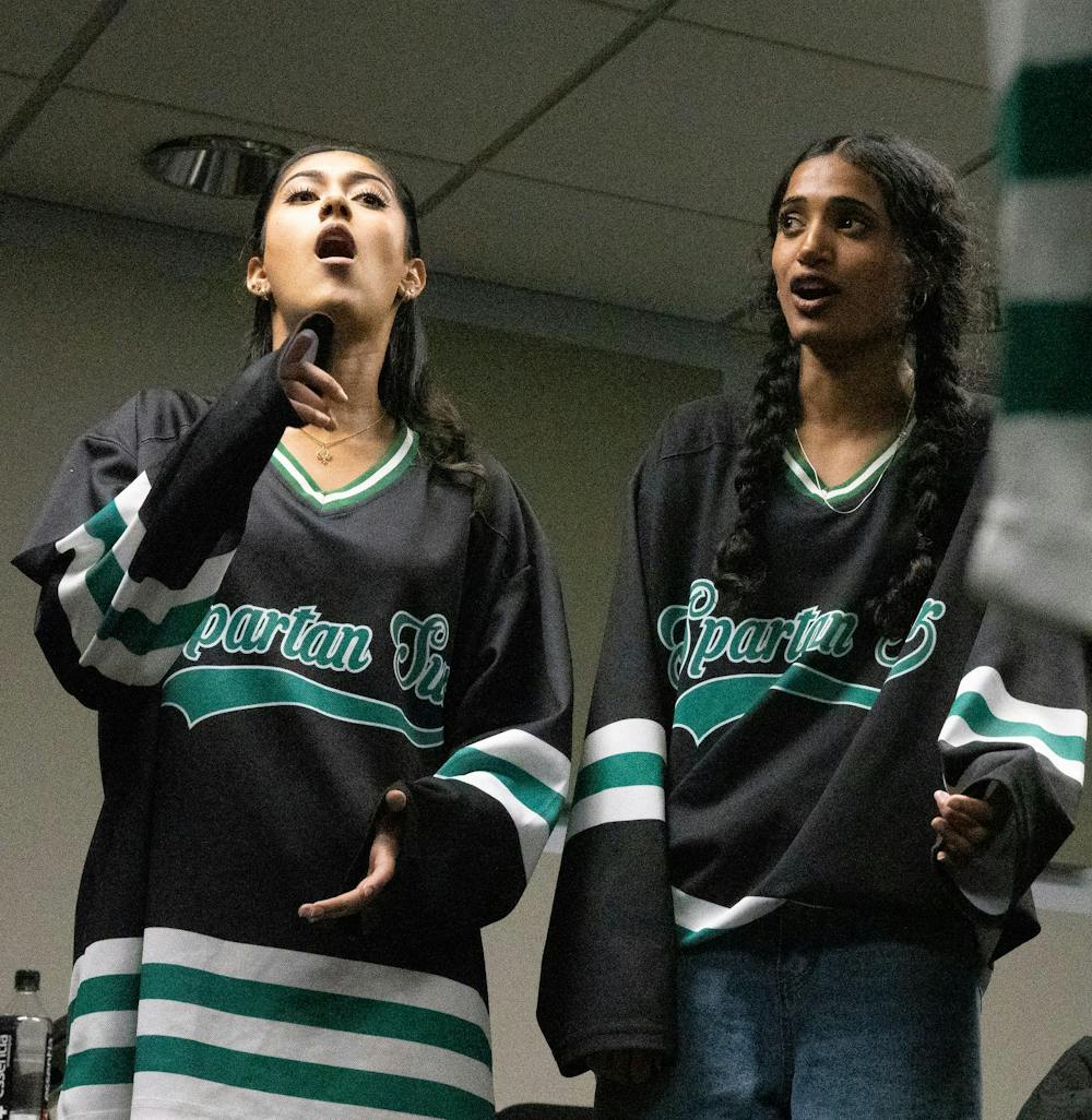 <p>Members of Michigan State University’s A Cappella group, Spartan Sur practice during a rehearsal in Sny-Phi on April 3, 2024.&nbsp; </p>