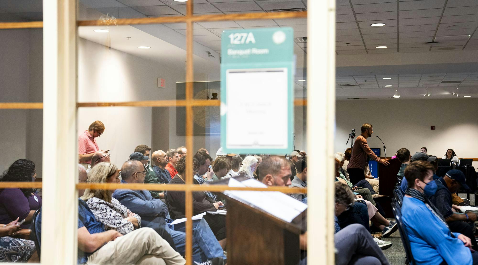 East Lansing residents gather to voice their concerns to the city council in the Hannah Community Center on Sept. 9, 2025. 