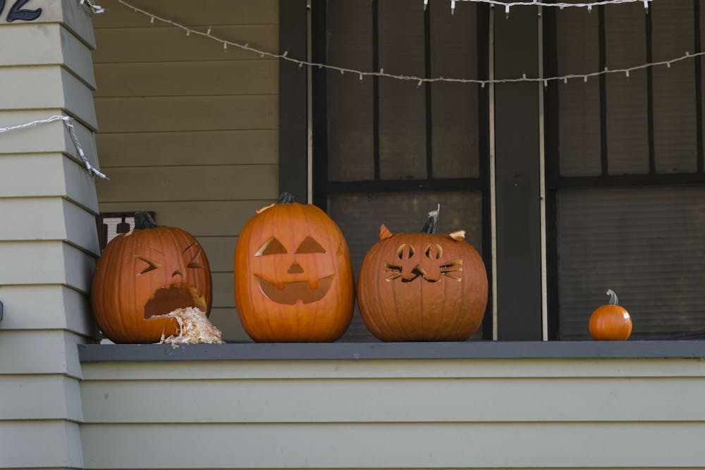Pumkins on a porch on Halloween in East Lansing, October 31, 2020.