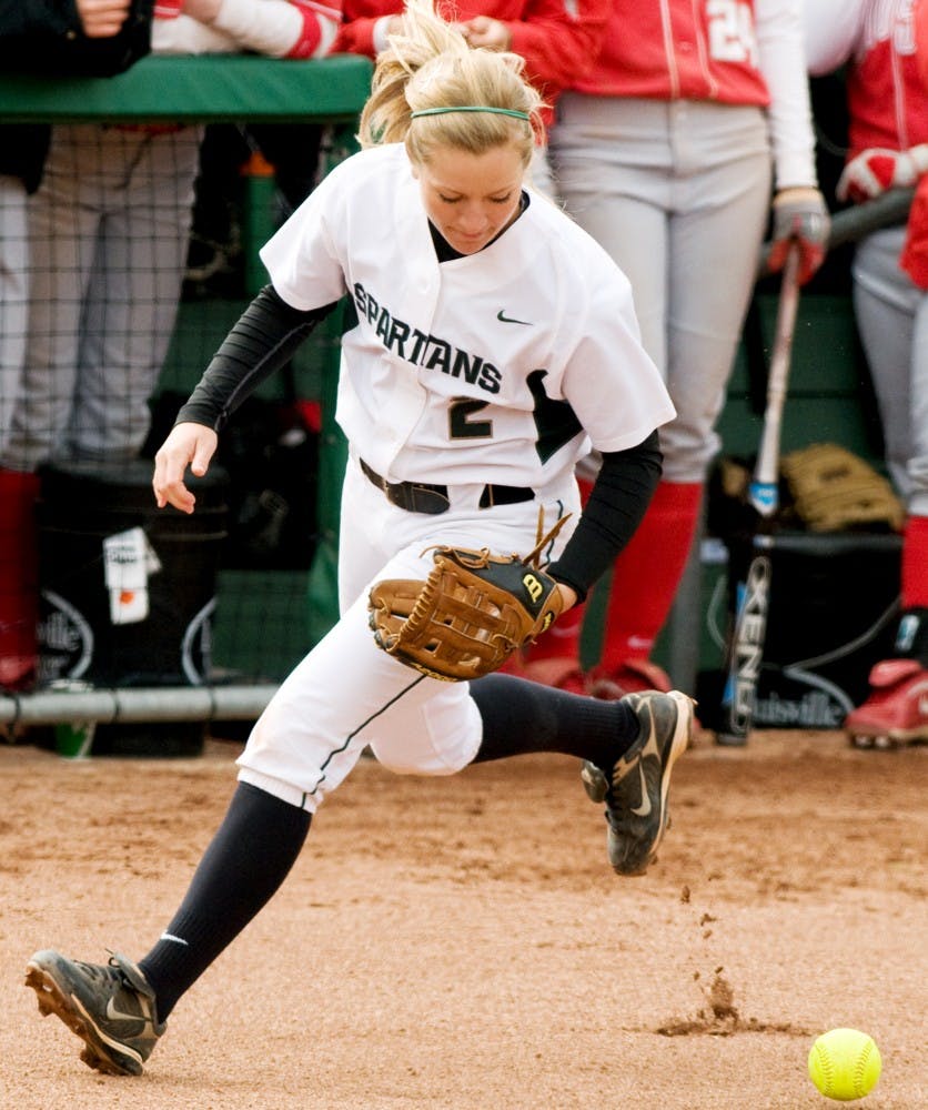 Junior third baseman Jayme O'Bryant attempts to field a ground ball Saturday afternoon at at Secchia Stadium at Old College Field. The Spartans lost 14-1 in their second game against the Buckeyes. Aaron Snyder/The State News.