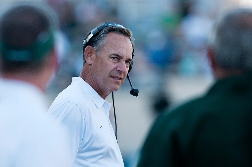 	<p>Head coach Mark Dantonio watches from the sidelines Sept. 14, 2013, at Spartan Stadium. The Spartans defeated Youngstown State, 55-17. Julia Nagy/The State News</p>