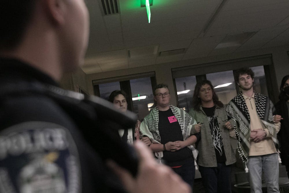 Students affiliated with the Hurriya Coalition were arrested on Friday, Oct. 25 after a sit-in demonstration at the Hannah Administration Building. Photo courtesy of Erick Diaz Veliz. 