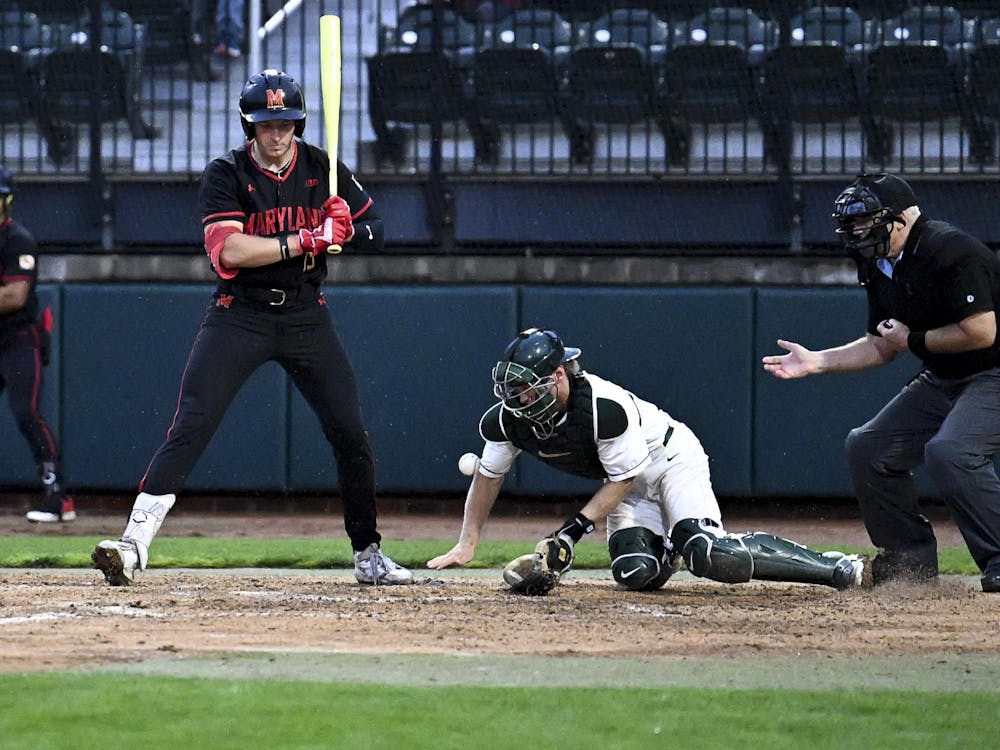 <p>MSU graduate student Noah Bright catches the ball after it bounces from his glove at Jeff Ishbia Field at McLane Baseball Stadium in East Lansing, Mich., on Friday, April 24, 2026. </p>