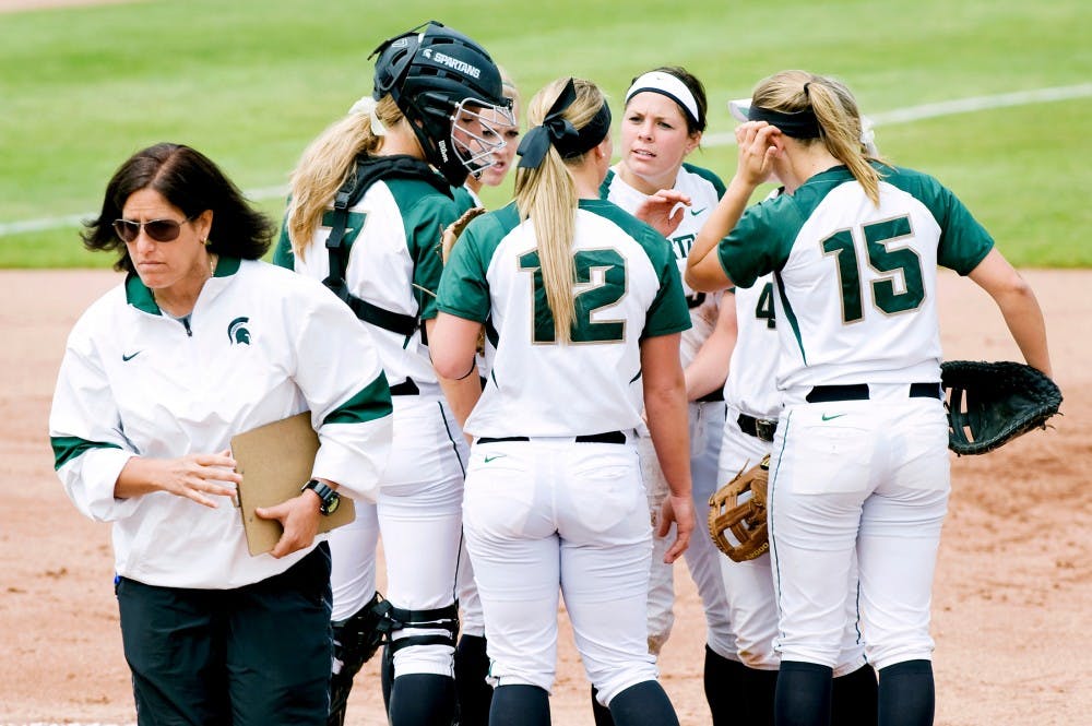 Head coach Jacquie Joseph walks off from the pitcher's plate after talking with softball players on Saturday afternoon at Secchia Stadium at Old College Field during the game against Michigan, which ended in a 8-0 loss. Justin Wan/The State News