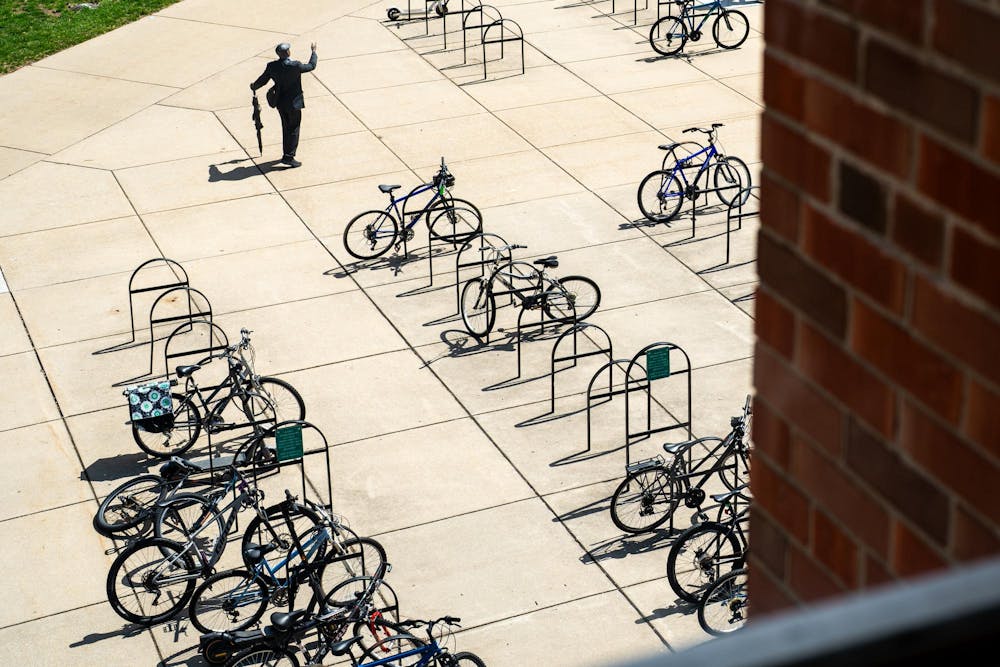 <p>Pastor Michael Venyah delivers a sermon outside Wells Hall in People’s Park on Michigan State University’s campus in East Lansing, Mich., on Monday, April 13, 2026.</p>