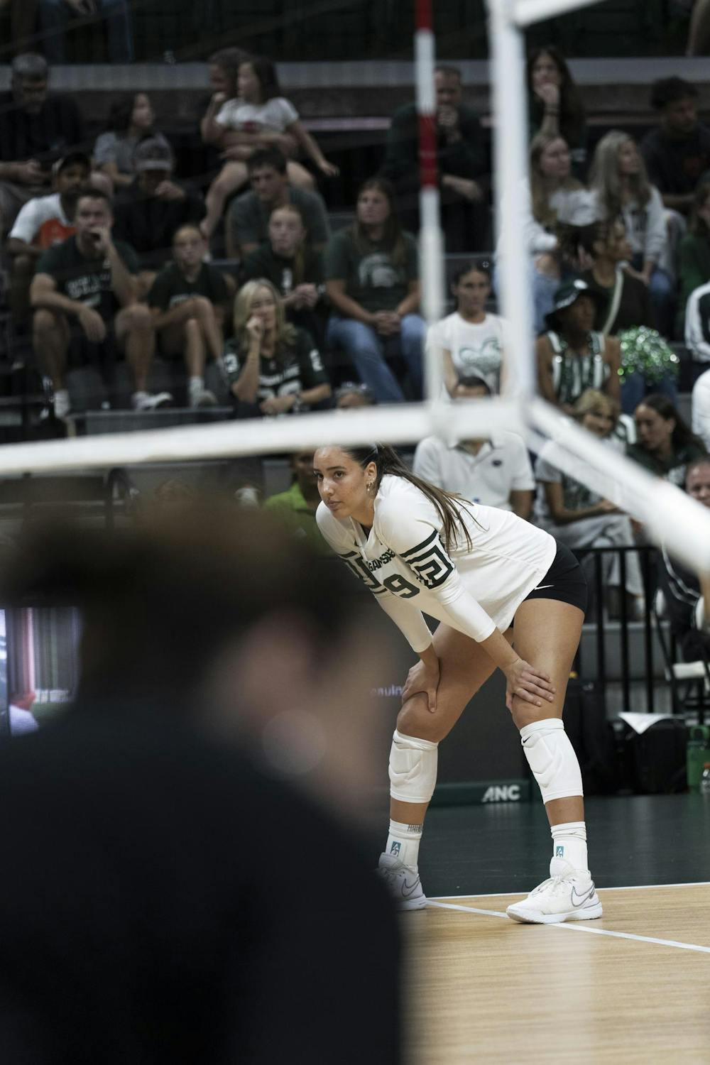 MSU Junior Hayley Ogden #19 sits at the next at the Breslin Center during the MSU v Pennstate Volleyball game In East Lansing, MI on Sunday Sep. 27th, 2026