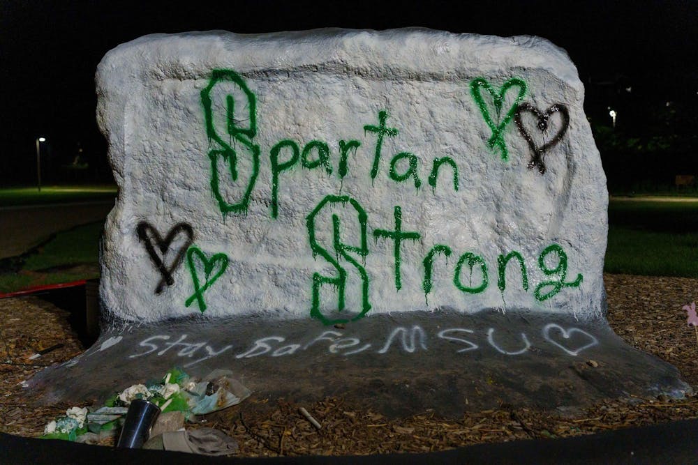 The Rock on Farm Lane is seen on July 21, 2023, after it was painted over, twice, for the first time since a Feb. 13 mass shooting on campus that killed three students and left five others severely injured. The Rock had displayed the same message for at least five months after the shooting, one of the longest periods with no changes in recent history. 