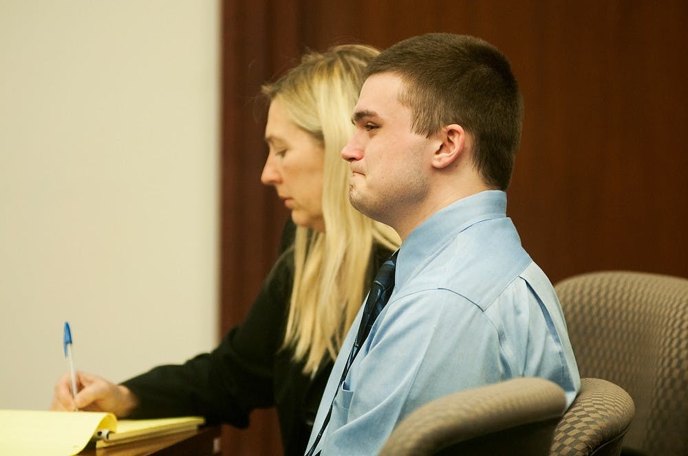 	<p>Alleged murderer Connor McCowan gets emotional during his father&#8217;s testimony at his trial Tuesday at Ingham County Circuit Court in Lansing. McCowan is on trial for open murder after the Feb. 23 killing of <span class="caps">MSU</span> student Andrew Singler.</p>