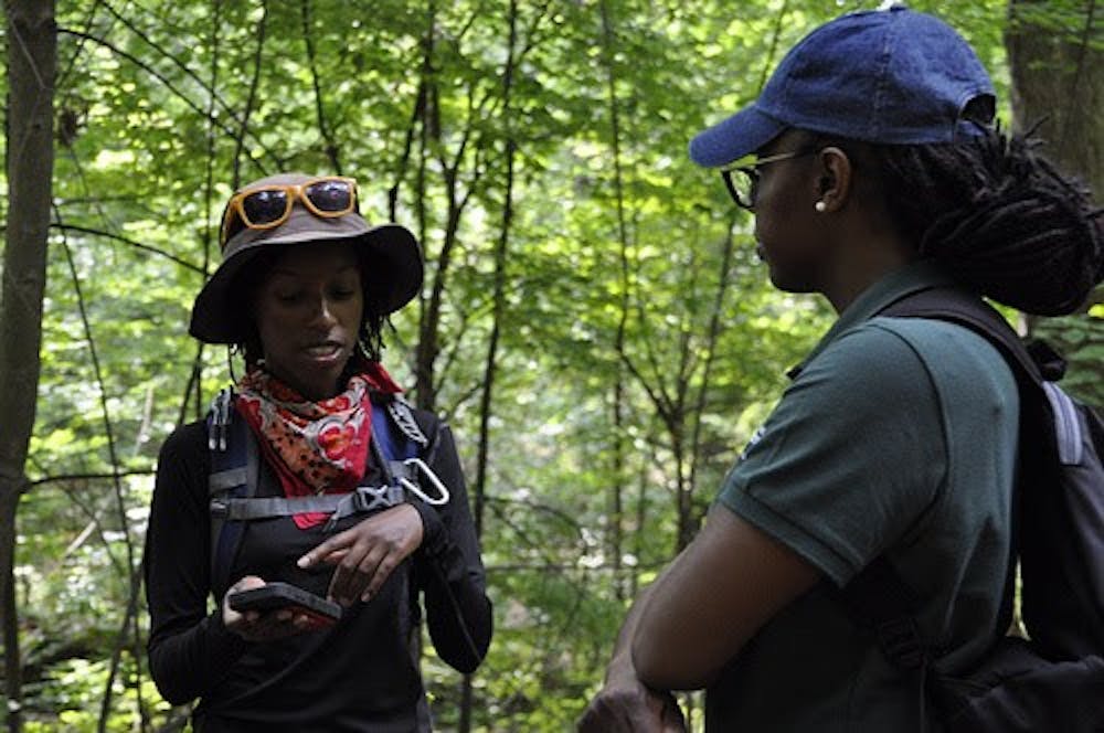 MSU Forestry graduate student Alex White talks with Forestry professor Asia Dowtin, a mentor in the Multicultural Apprenticeship Program. Photo courtesy of the MSU Department of Forestry. 