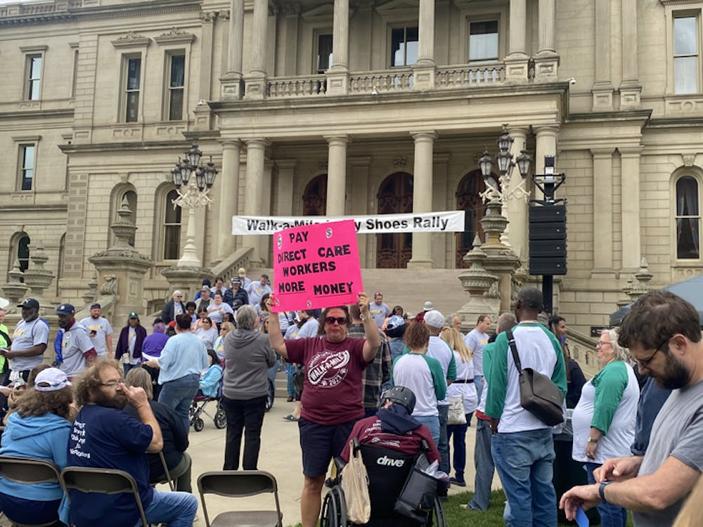 <p>Thousands of Michiganders gather outside the Lansing Capitol Building to raise awareness for mental health and wellness. </p>