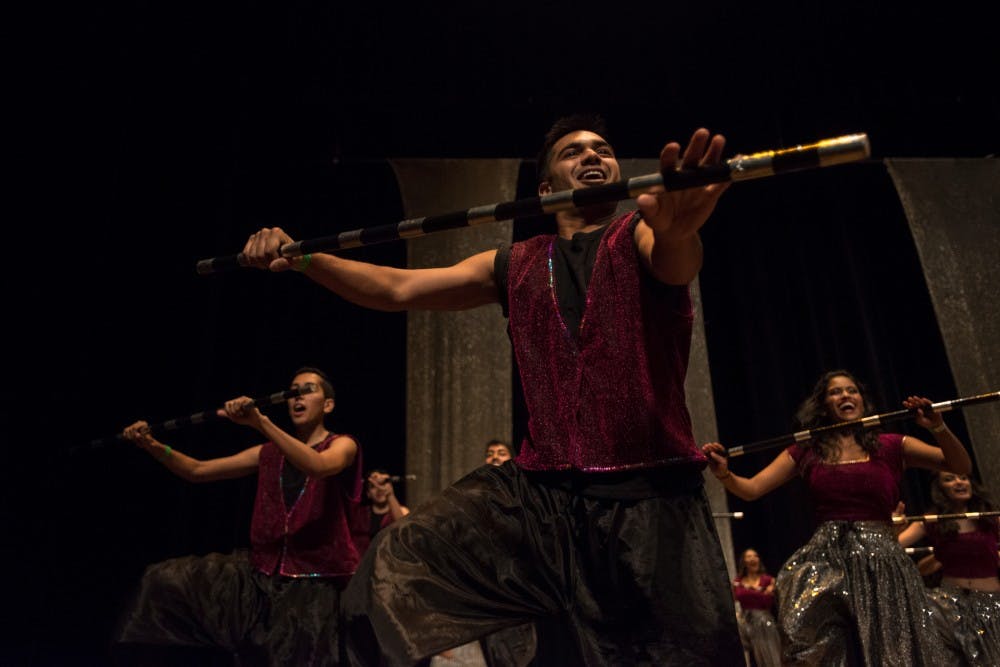 Mechanical engineering senior Sapan Patel performs with the Fusion dance group during Saathiya on April 9, 2016 at the Wharton Center. Saathiya is an event put on by the Coalition of Indian Undergraduate Students at MSU. 