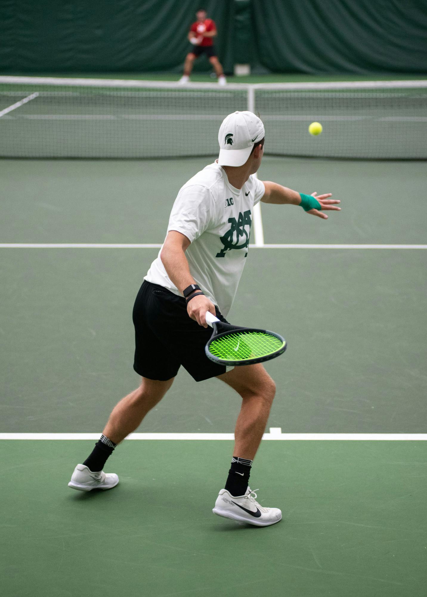 <p>Sophomore Graydon Lair returns the ball during the Big Ten Indoor Tournament on Nov. 5, 2021.</p>