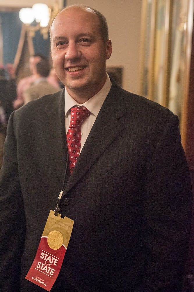 <p>Cutis Hertel Jr., D-East Lansing, poses for a photo Jan. 20, 2015, at the State of the State Address at the Capitol in Lansing, Michigan. Emily Nagle/The State News</p>