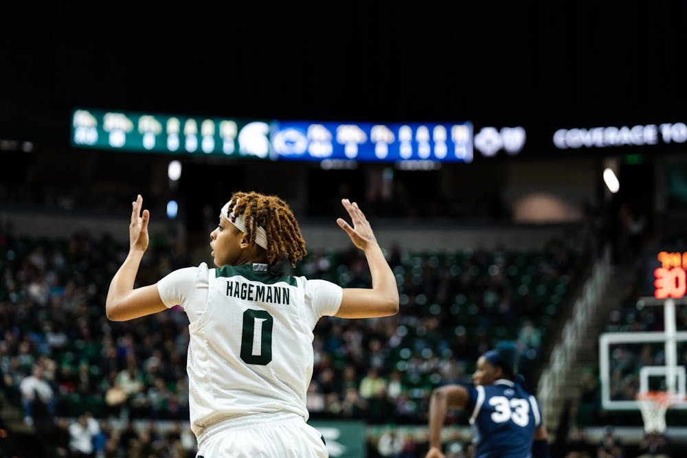 <p>Sophomore guard DeeDee Hagemann (0) signals to her teammates after scoring. MSU went on to win against Penn State 81-75 in overtime on Feb. 12, 2023.</p>